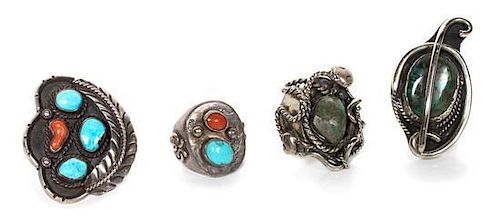 * Four Large Southwestern Silver and Turquoise Rings