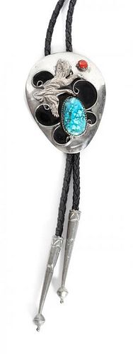A Southwestern Silver, Turquoise and Coral Bolo Height 2 1/2 inches.