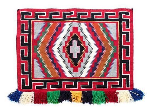 A Navajo Germantown Sunday Saddle Blanket 26 1/4 X 35 1/2 inches.