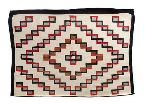 A Navajo Regional Rug First: 58 x 62 1/4 inches.