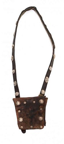 A Navajo Leather and Silver Bandolier Button Bag Length of bandolier 26 inches.