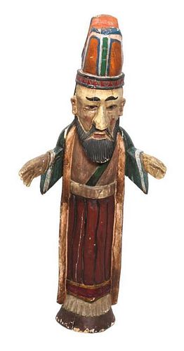 A Polychrome Carved Wood Santos Height 39 1/4 inches.