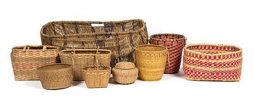 A Group of Native Gathering and Storage Baskets Height of largest 14 1/2 x length 33 x depth 25 3/4 inches.