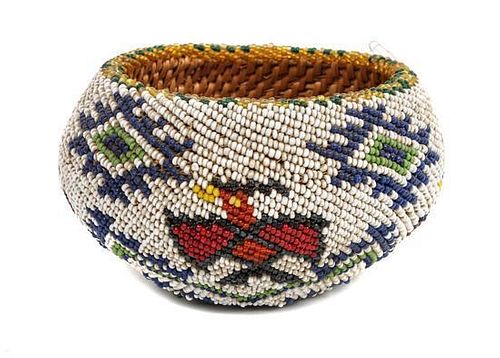 A Yosemite Area Beaded Gift Basket Height 2 1/2 x diameter 4 1/2 inches.