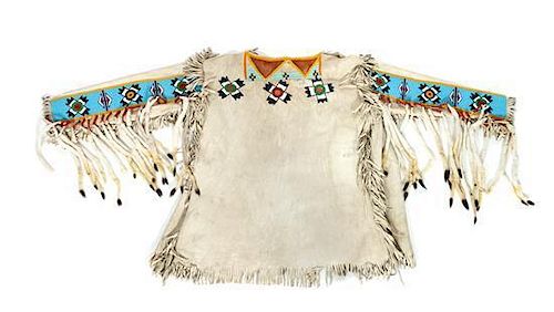A Blackfeet Beaded and Hide Men's Jacket Maximum width 60 inches.