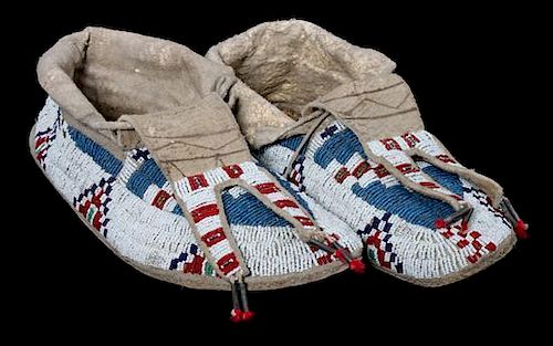 A Pair of Sioux Beaded Moccasins Length 11 1/2 inches.