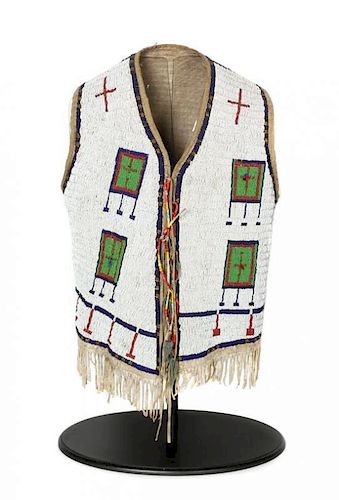 A Sioux Beaded Child's Vest Length overall 20 inches.