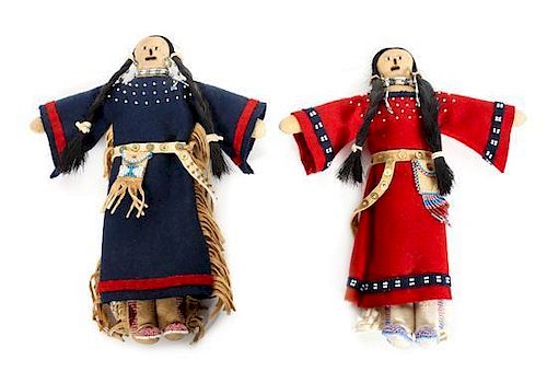 Two Sioux Hide and Trade Cloth Dolls Height of dolls 9 1/2 inches.