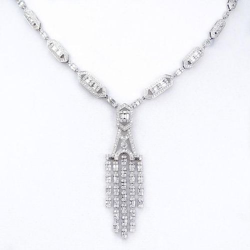 Art Deco style Approx. 10.0 Carat Round Brilliant and Baguette Cut Diamond and 18 Karat White Gold Pendant Necklace.