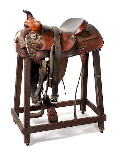 A Brown Leather Dude Saddle Seat 15 1/4 inches.