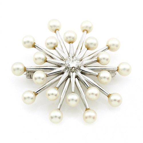 14k White gold, pearl and diamond brooch.