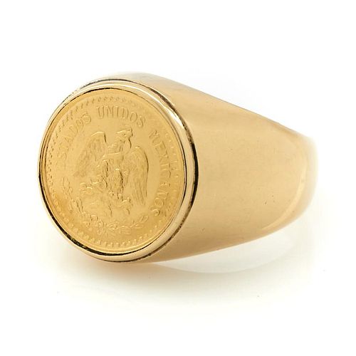 14k Yellow gold Mexican coin ring.