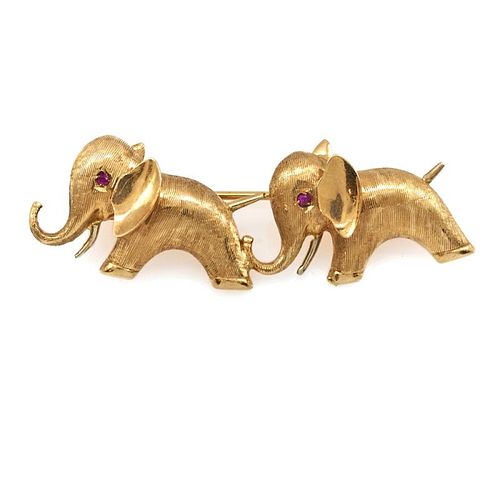 18k Yellow gold and ruby elephant brooch.