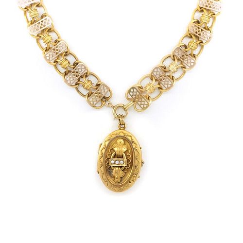 14k Yellow gold Victorian locket on chain necklace.