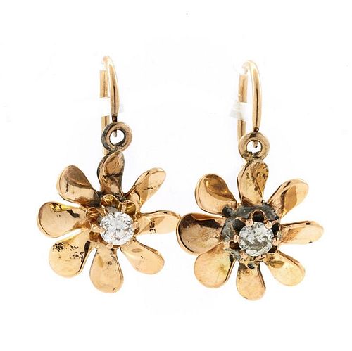 18k Rose gold and diamond earrings.