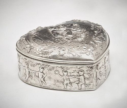 Silver repousse heart shaped box