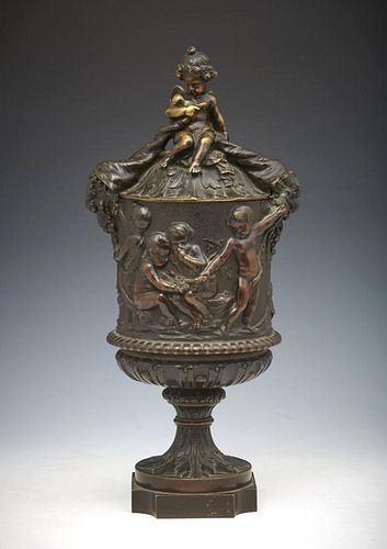 Bronze lidded urn decorated with cupid, cornucopias, 15"h