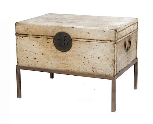 Chinese pigskin trunk on painted metal stand