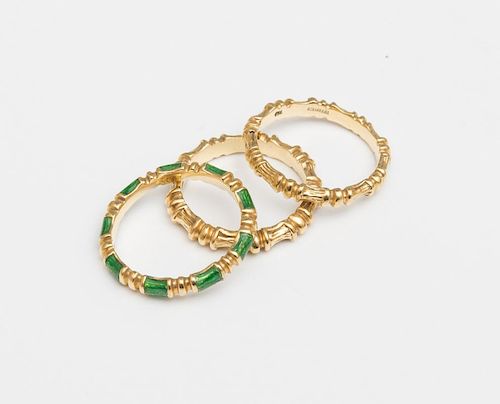 THREE TIFFANY AND CO. 18K GOLD AND 18K GOLD AND ENAMEL BAMBOO STACKABLE RINGS