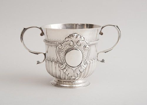 QUEEN ANNE SILVER TWO-HANDLED FLUTED CUP WITH RAISED BLIND CARTOUCHE