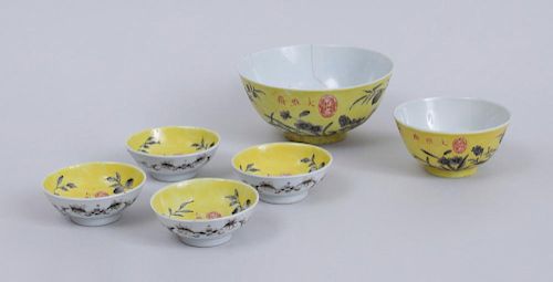 TWO CHINESE YELLOW-GROUND BOWLS AND FOUR SAUCE DISHES