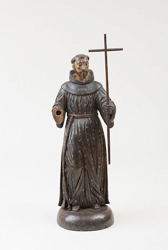 ITALIAN BLACK AND CREAM PAINTED FIGURE OF ST. FRANCIS OF ASSISI