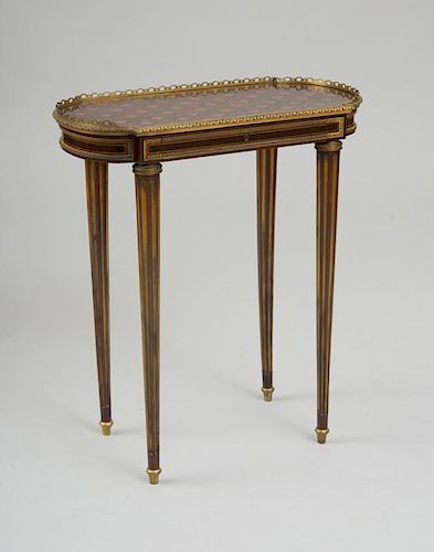 LOUIS XVI STYLE ORMOLU-MOUNTED KINGWOOD AND TULIPWOOD PARQUETRY TABLE À ÉCRIRE