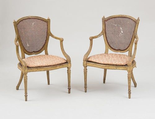 PAIR OF CONTINENTAL NEOCLASSICAL PAINTED AND CANED ARMCHAIRS, PROBABLY ITALIAN