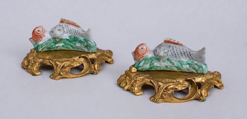 PAIR OF CHINESE PORCELAIN CARP GROUPS ON LOUIS XV STYLE GILT-BRONZE STANDS