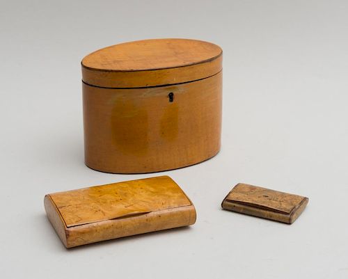 GEORGE III SATINWOOD OVAL TEA CADDY AND TWO BURRWOOD CIGARETTE CASES