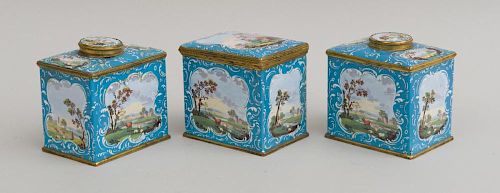 PAIR OF SOUTH STAFFORDSHIRE SKY BLUE-GROUND ENAMEL TEA CADDIES AND A MATCHING SUGAR BOX