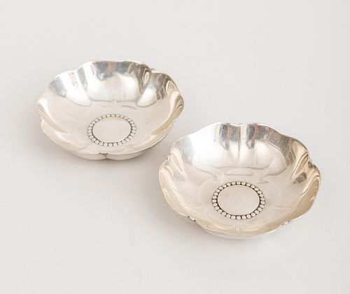 PAIR OF TIFFANY & CO. SILVER PENTAFOIL FLORIFORM DISHES