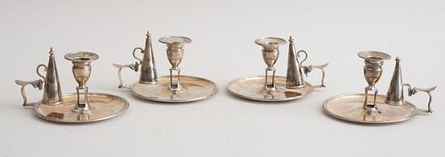 THREE GEORGE III CRESTED SILVER CHAMBER CANDLESTICKS AND A SIMILAR SINGLE CRESTED CHAMBER CANDLESTICK