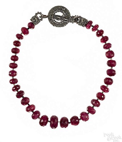 Necklace with graduated ruby beads