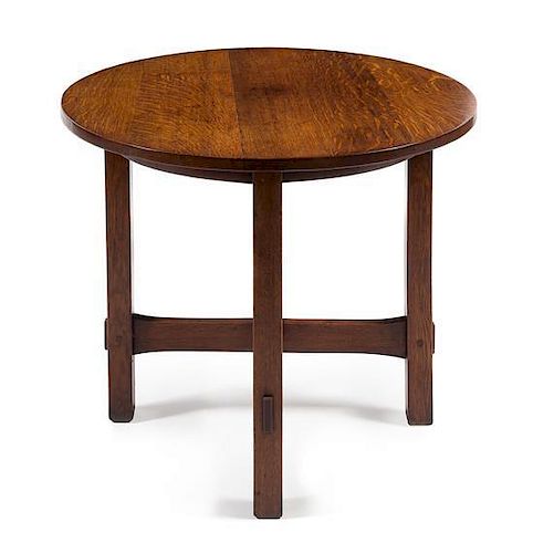 * Gustav Stickley, (American, 1858-1942), a circular oak table, model no. 645