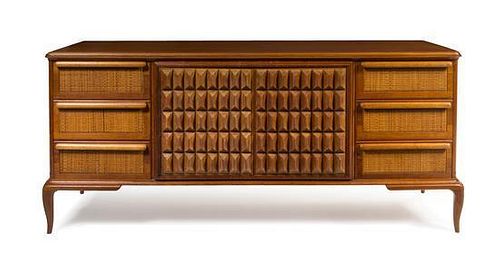 Italian, c.1950, a sideboard with carved wood doors