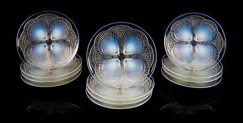 Rene Lalique, (French, 1860-1945), a set of 12 Coquilles dinner plates, no. 3011