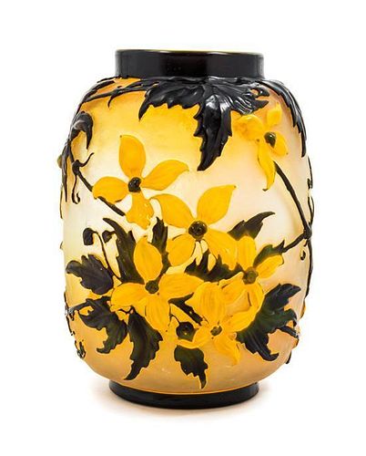 * Emile Galle, (French, 1846-1904), a mold blown cameo glass vase, with clematis decoration