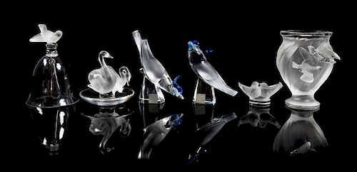Lalique, a group of six molded and frosted glass bird motif table articles, comprising a vase, a bell, a ring tray and three 