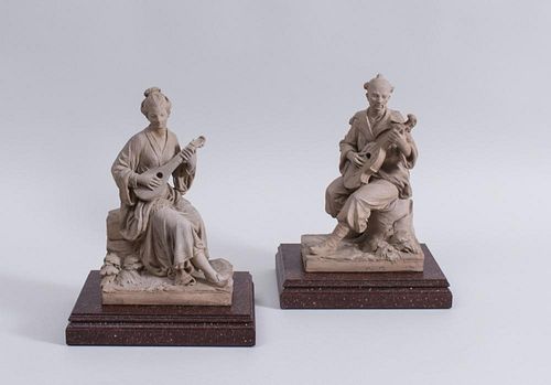 PAIR OF CONTINENTAL TERRACOTTA MODELS OF ASIAN MUSICIANS