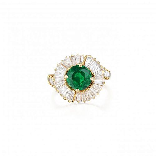 An Emerald and Diamond Ballerina Ring