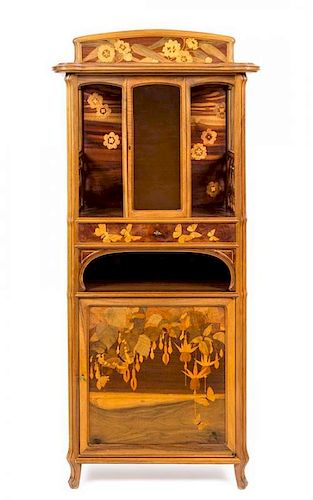 * An Emile Galle Various Woods Marquetry Vitrine, Height 56 x width 25 1/4 x depth 14 1/2 inches.