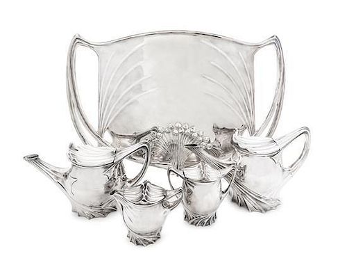 * A German Art Nouveau Silver-Plate Four-Piece Tea and Coffee Set and Matching Tray, Length of tray over handles 24 1/4 inches.