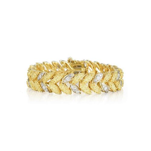 A Gold and Diamond Leaf Bracelet