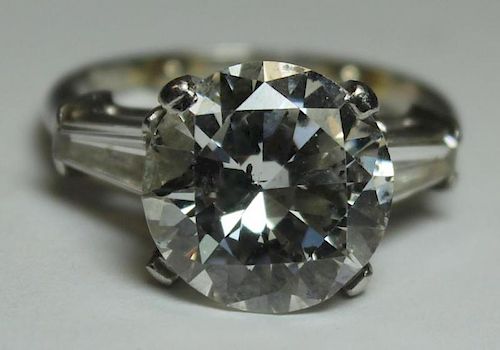 JEWELRY. GIA 5.94 Ct Diamond and Platinum Ring.
