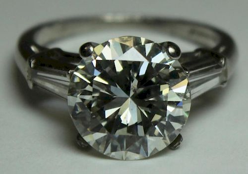 JEWELRY. GIA 5.39 Ct. Diamond and Platinum Ring.