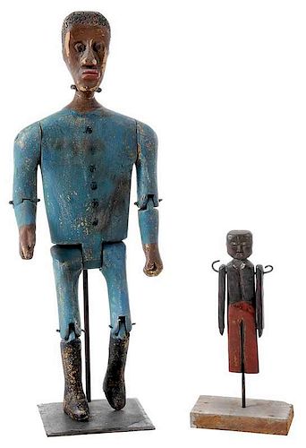 Two Carved and Painted Black Figures