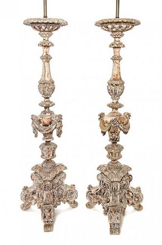 A Pair of Italian Baroque Style Painted Pricket Sticks Height overall 47 1/2 inches.