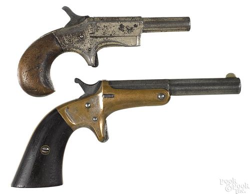 Two spur trigger single shot pistols