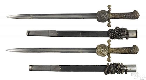 Pair of German hunting swords with scabbards